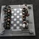 Illustration for article titled This Alien versus Predator chessboard was built for chessboxing